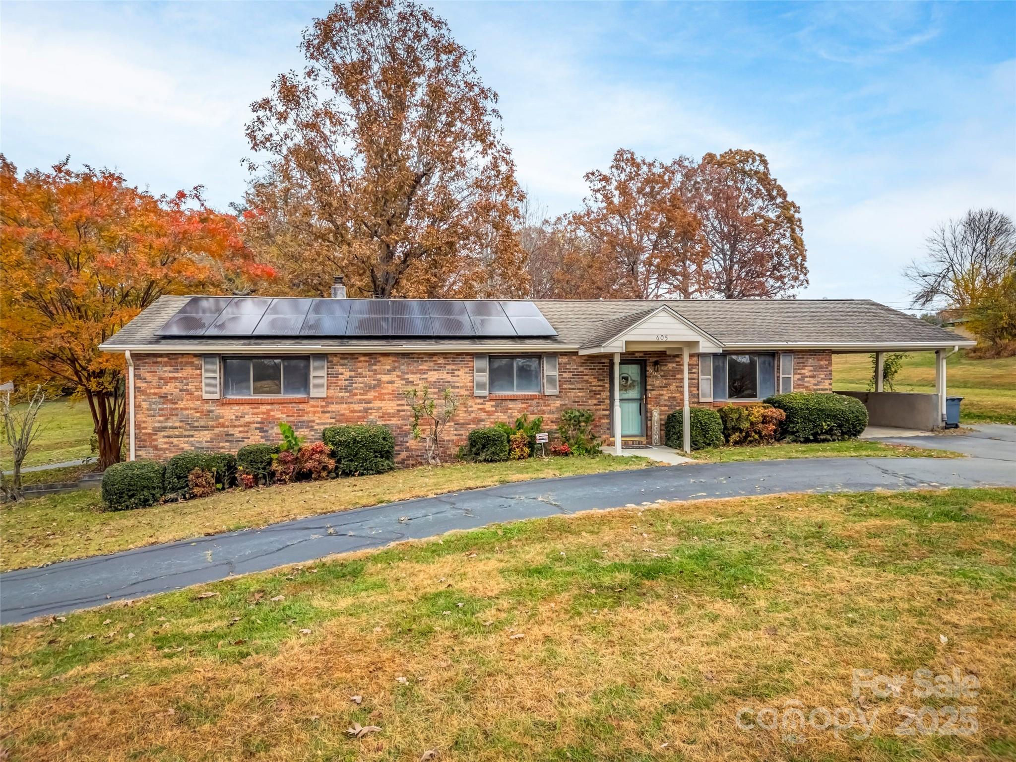 605 Dana Road Hendersonville, NC 28792 - Photo 2 of 38 a front view of a house with a yard