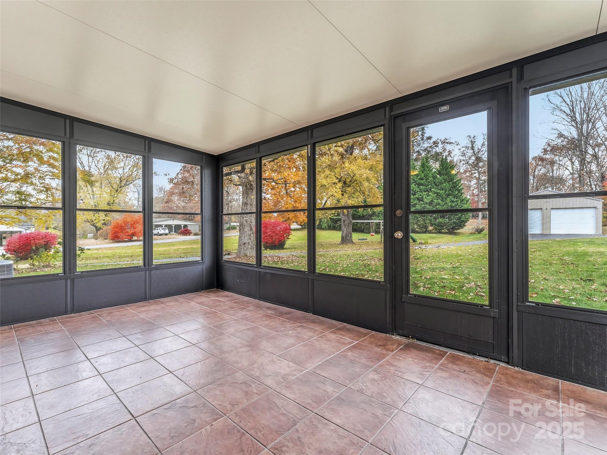 605 Dana Road Hendersonville, NC 28792 - Photo 30 of 38 a view of an empty room with a large window
