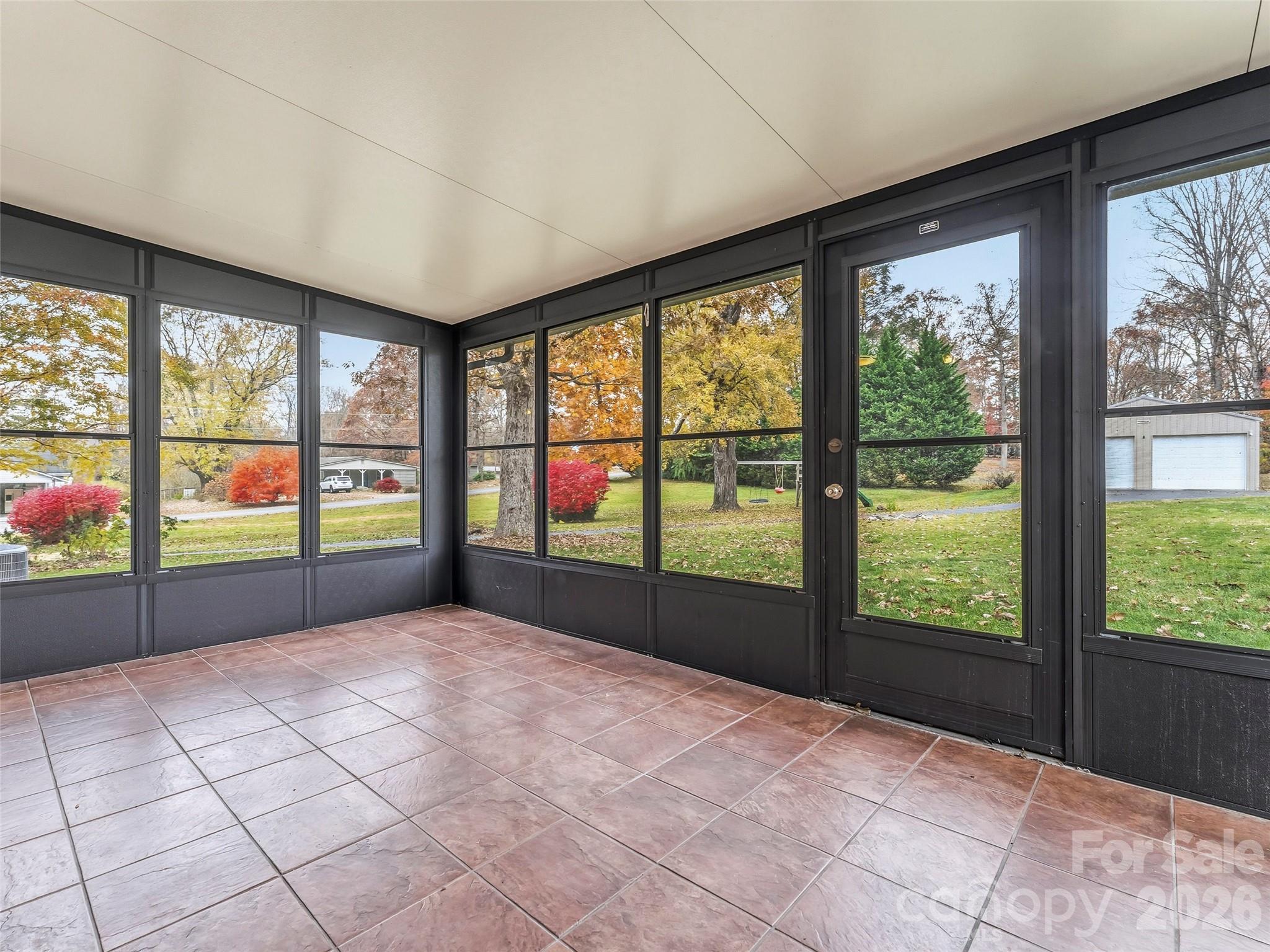 605 Dana Road Hendersonville, NC 28792 - Photo 31 of 38 a view of an empty room with a large window