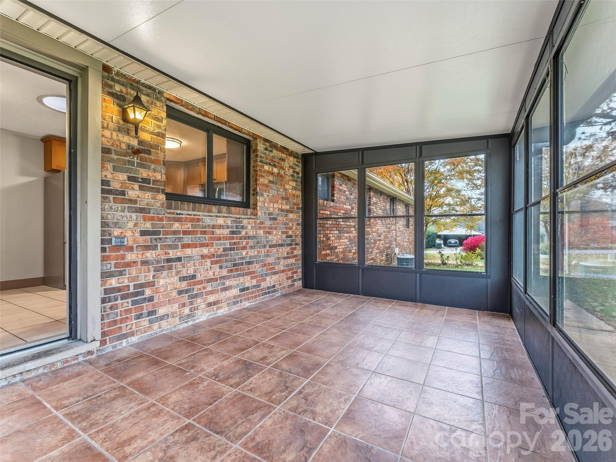 605 Dana Road Hendersonville, NC 28792 - Photo 32 of 38 a view of empty room with windows