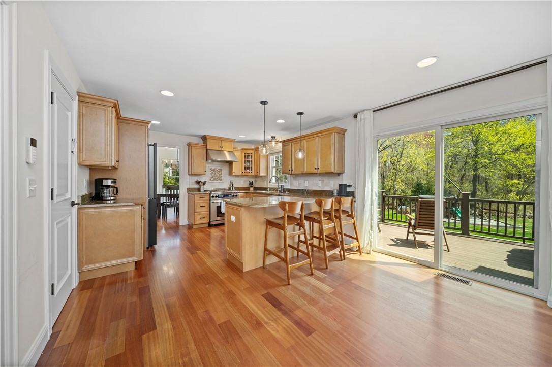 288 Middle Road East Greenwich, RI 02818 - Photo 5 of 30 Kitchen eating area with sliders to deck