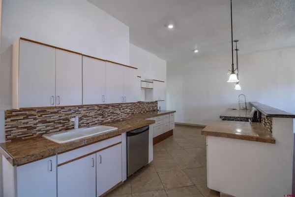 $375,000 | 918 Highway 170, Farmington, NM 87401