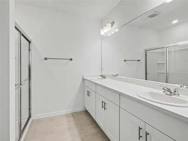 a bathroom view of a toilet and a sink