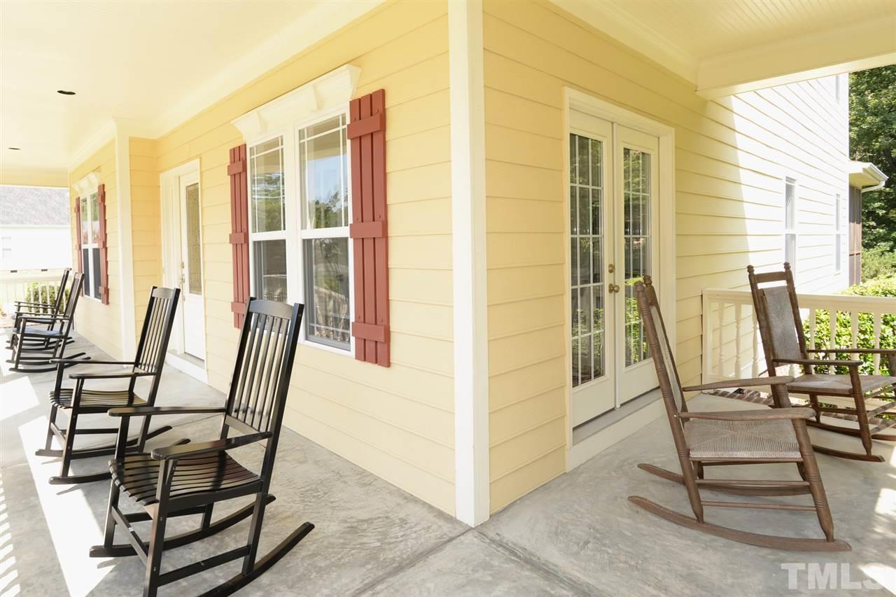 1021 Grissom Farm Road Garner, NC 27529 - Photo 2 of 25 a view of a balcony with chairs