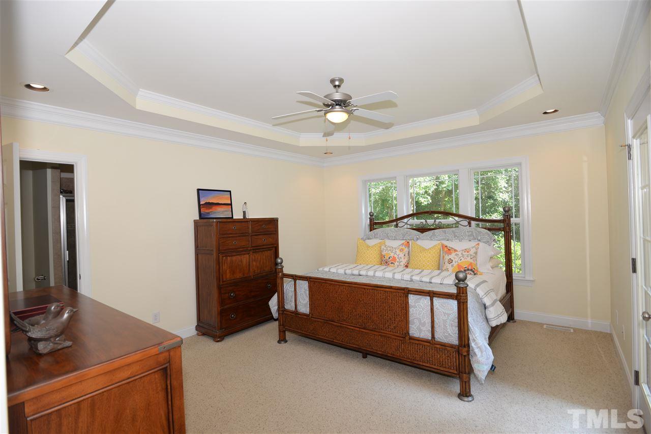 1021 Grissom Farm Road Garner, NC 27529 - Photo 12 of 25 a bedroom with furniture and a window