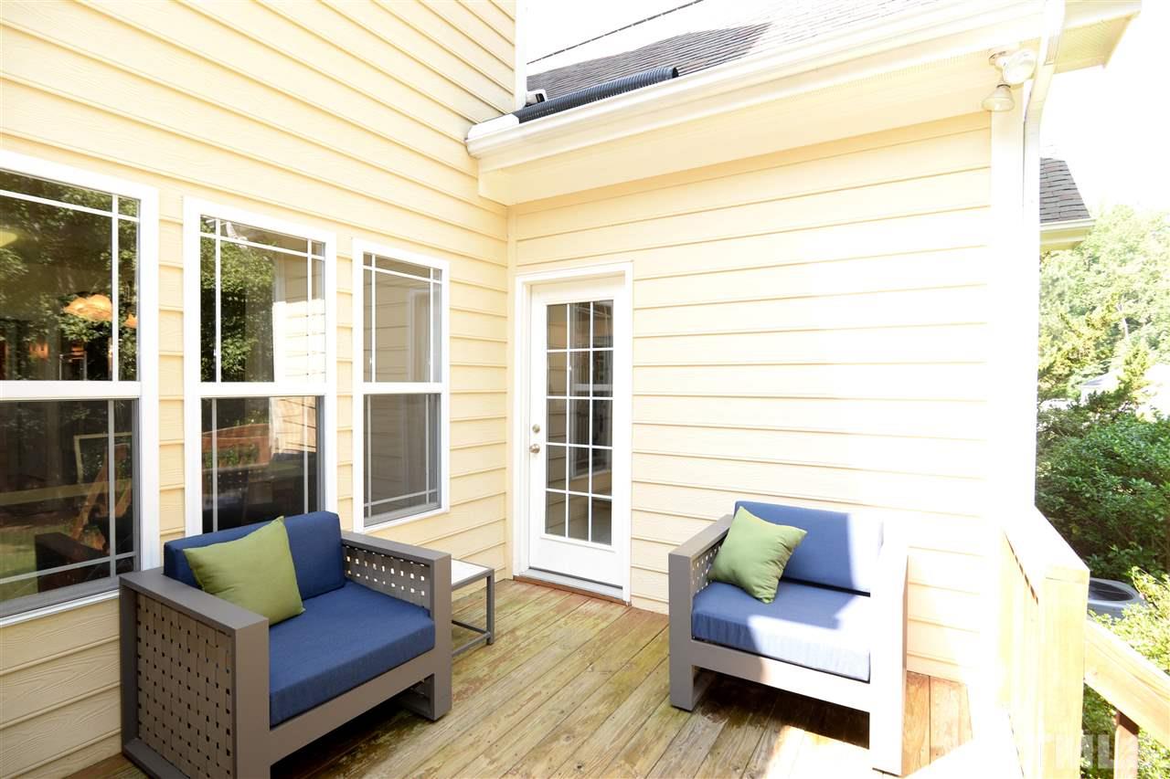 1021 Grissom Farm Road Garner, NC 27529 - Photo 20 of 25 a view of a couch in the balcony