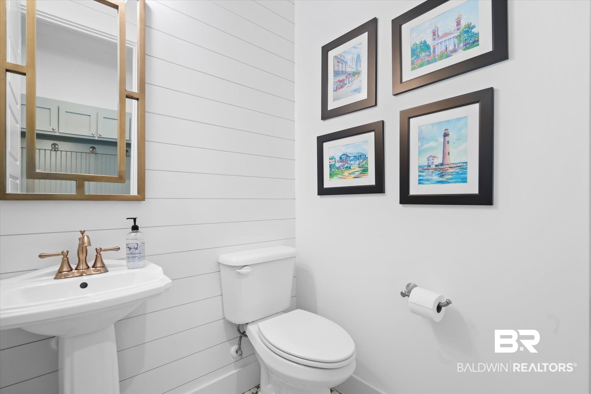 15 Semmes Avenue Mobile, AL 36604 - Photo 13 of 43 Bathroom with sink, toilet, and wood walls
