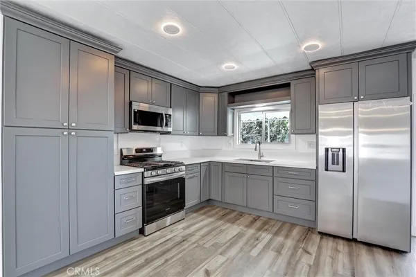 a view of kitchen and windows