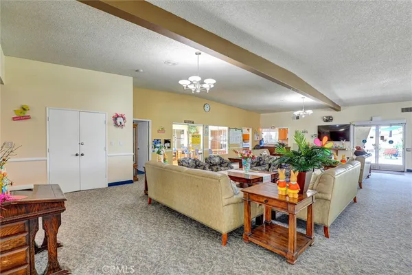 a living room with dining table