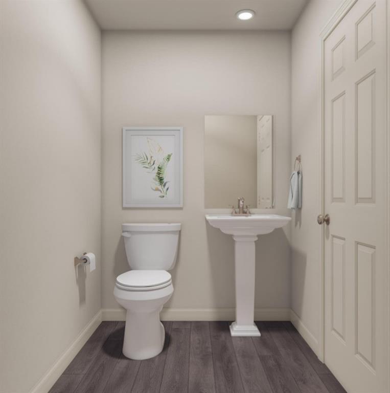 13417 Balderdash Court Cresson, TX 76035 - Photo 11 of 40 a bathroom with a toilet sink and mirror