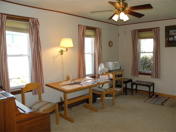 88 Hardy Pond Road Waltham, MA 02451 - Photo 15 of 29 a living room with furniture and a window