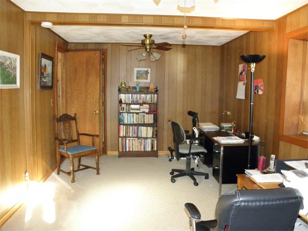 88 Hardy Pond Road Waltham, MA 02451 - Photo 16 of 29 a view of a livingroom with workspace and a window