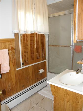 88 Hardy Pond Road Waltham, MA 02451 - Photo 19 of 29 a bathroom with a sink and a mirror