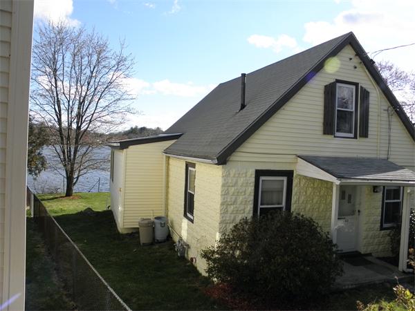 88 Hardy Pond Road Waltham, MA 02451 - Photo 3 of 29 a front view of a house with garden