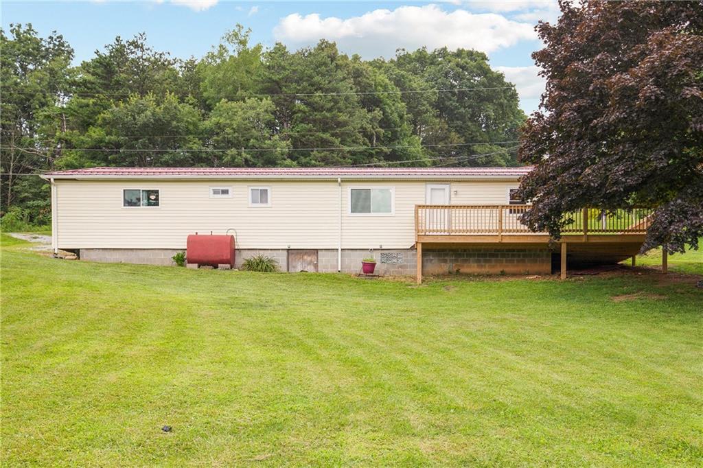 189 Anna Beth Road Acme, PA 15610 - Photo 1 of 32 a view of backyard with seating area