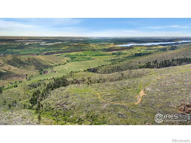 a view of an ocean and mountain