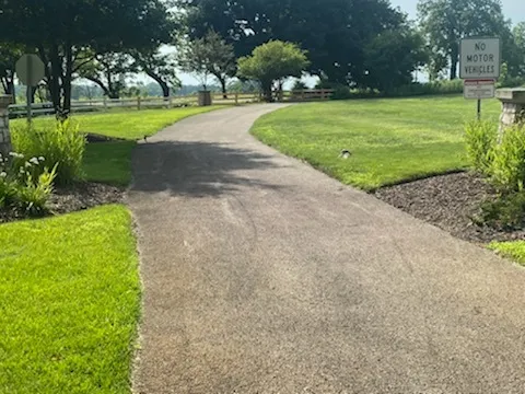 a view of a golf course with a garden