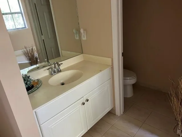 a bathroom with a sink and toilet