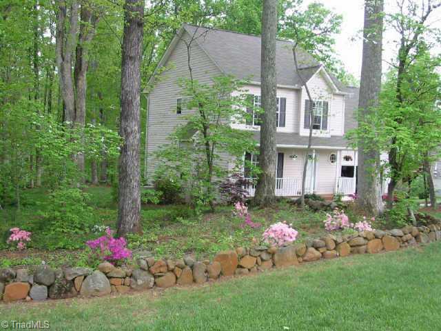8101 Daltonshire Drive Oak Ridge, NC 27310 - Photo 1 of 6 Exterior Front.