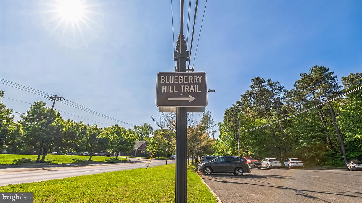 23 Clementon Road East Gibbsboro, NJ 08026 - Photo 9 of 40 a view of a street with houses