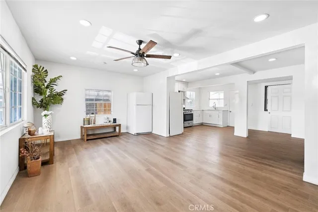 a view of livingroom with furniture window and wooden floor