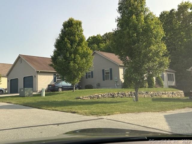 61 Deerwood Drive Killingly, CT 06239 - Photo 13 of 21 a view of a house with a yard