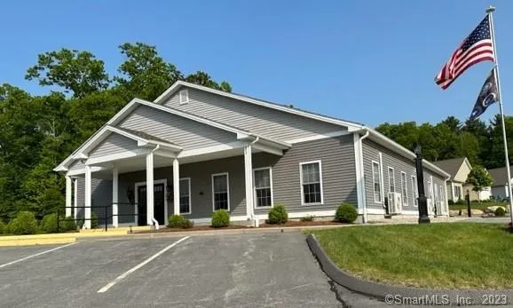 front view of a house with a patio