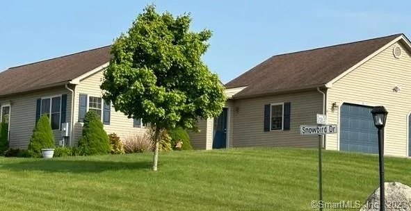 a house view with a garden space