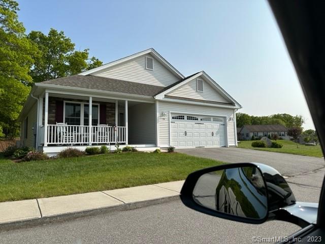 61 Deerwood Drive Killingly, CT 06239 - Photo 7 of 21 a front view of a house with a yard