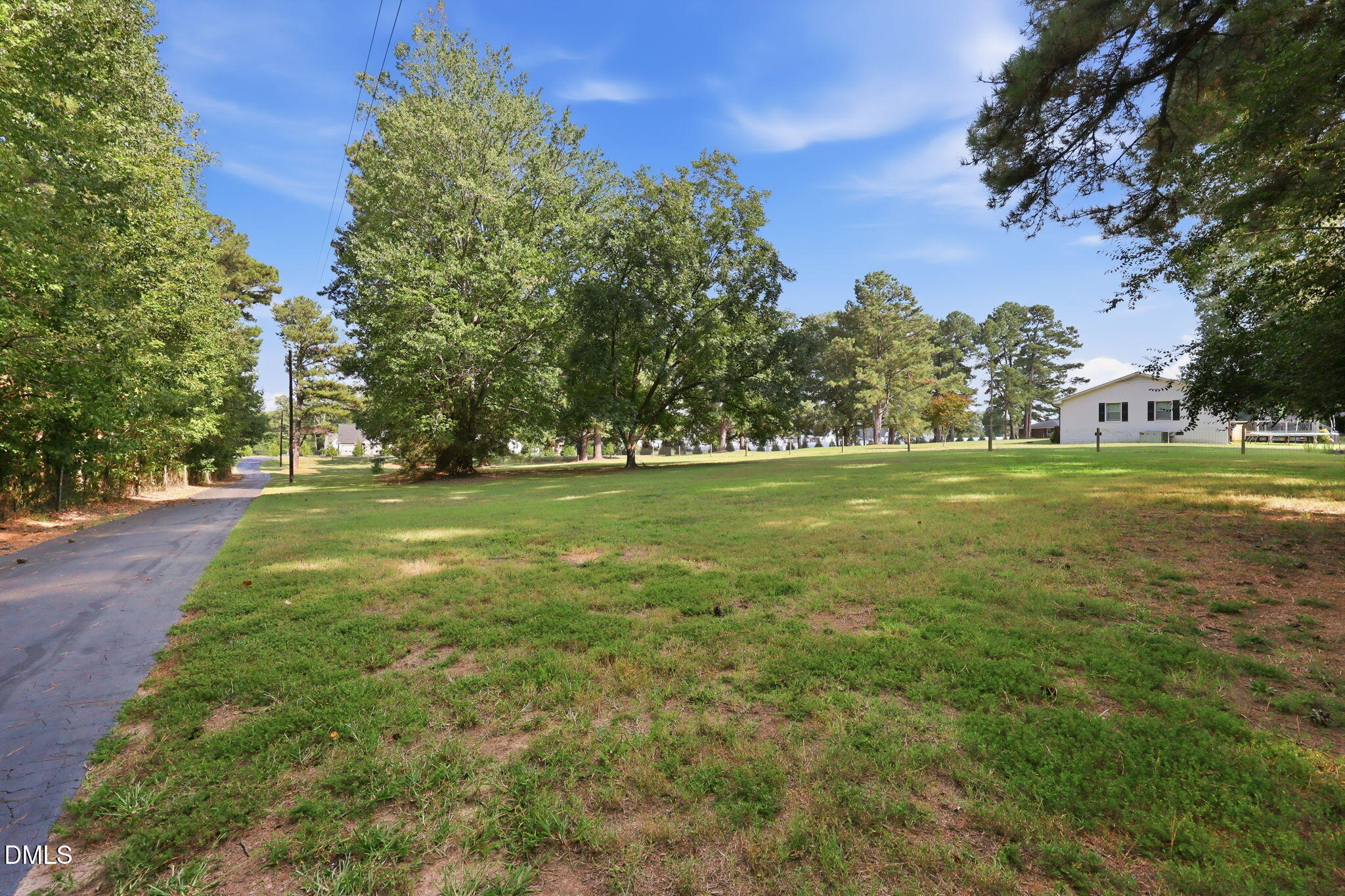 946 Cooke Road Louisburg, NC 27549 - Photo 42 of 44 Long winging driveway offeres privacy