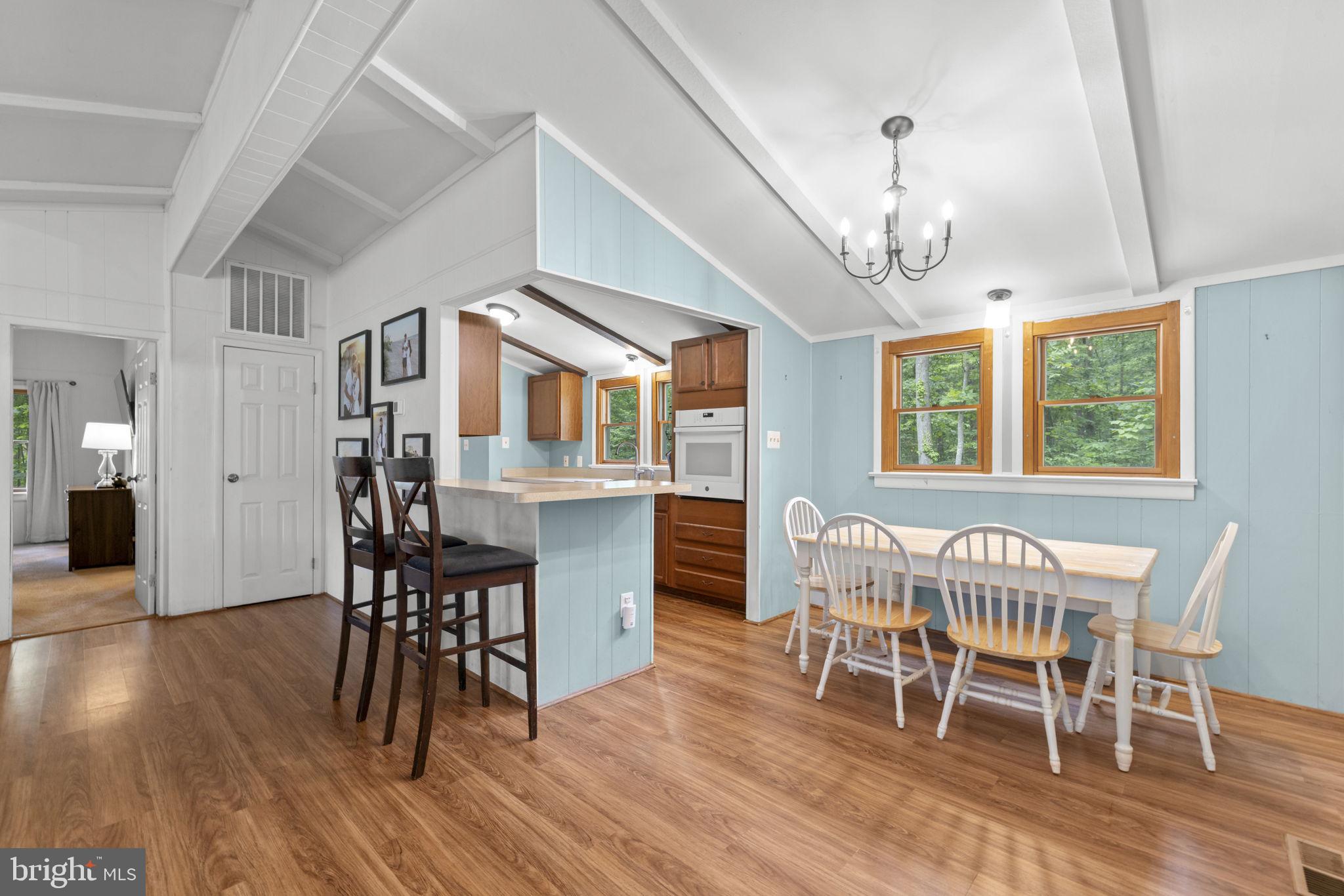 9448 Green Road Midland, VA 22728 - Photo 27 of 91 a view of a dining room with furniture window and wooden floor