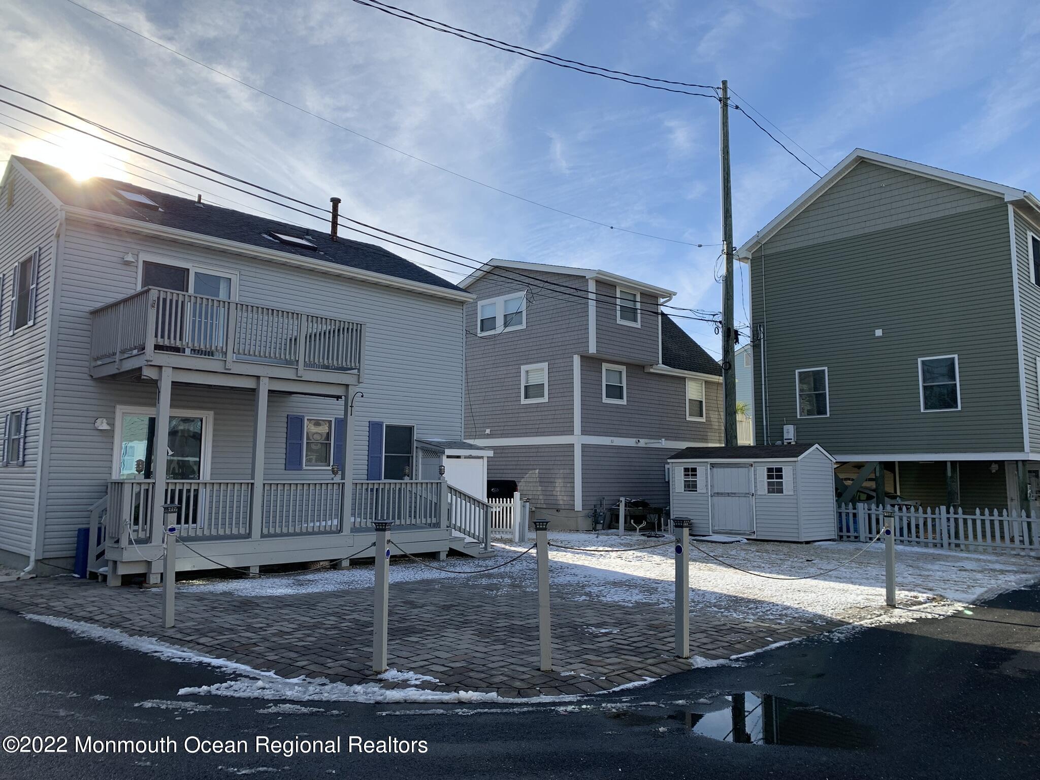 111 Throssell Road Lavallette, NJ 08735 - Photo 1 of 2 a view of a house with a patio
