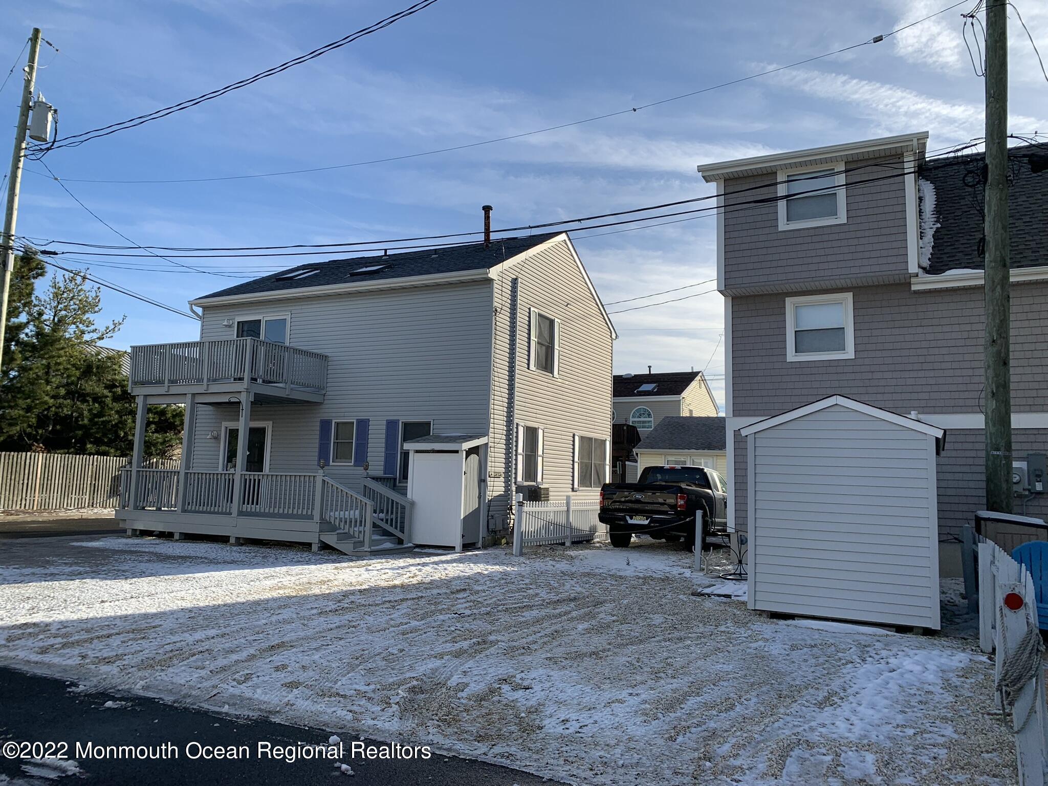 111 Throssell Road Lavallette, NJ 08735 - Photo 2 of 2 a view of back yard of the house