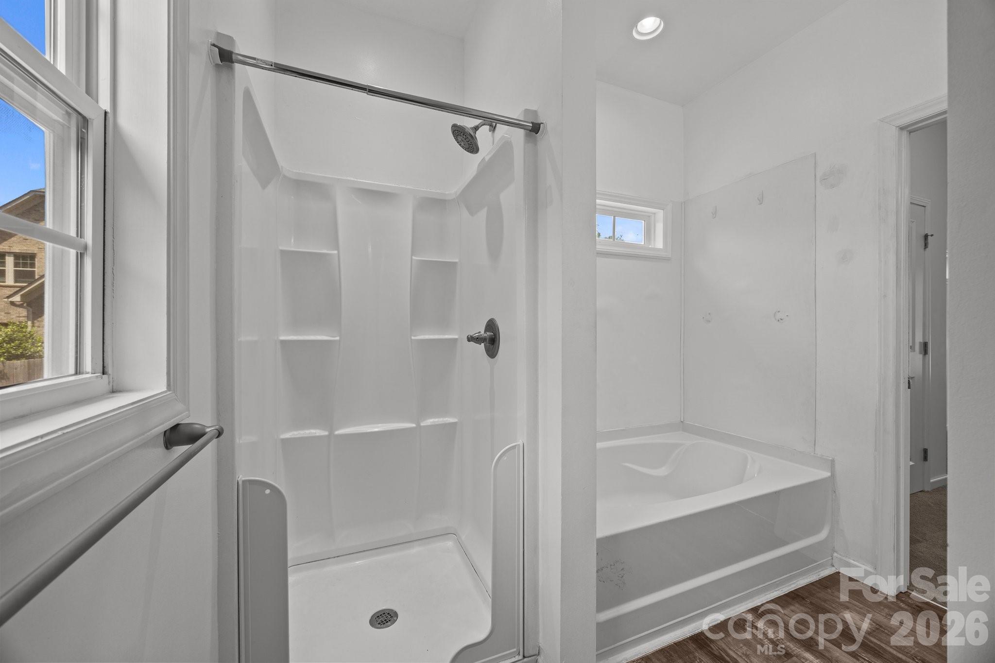 14532 East Rocky River Road Davidson, NC 28036 - Photo 26 of 32 a bathroom with a bathtub
