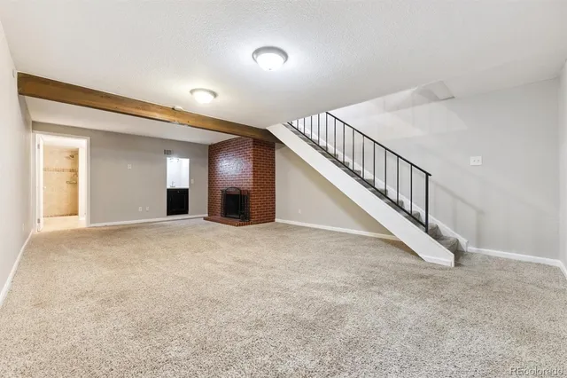 a view of an entryway with a hallway