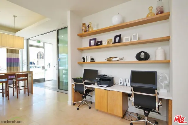 a view of dining room with furniture and wooden floor