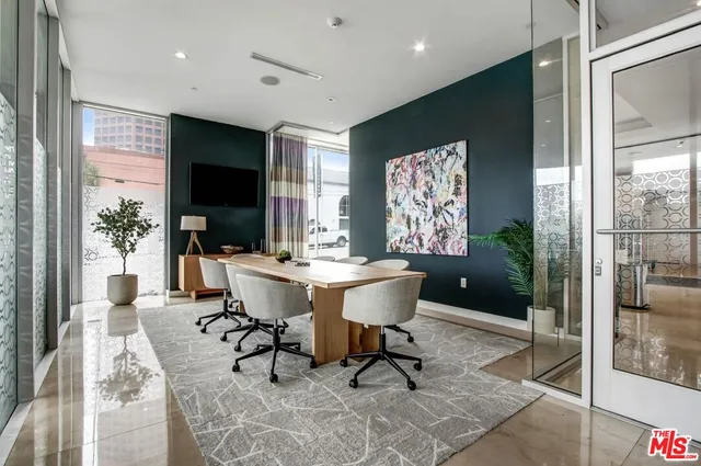 a view of a dining room with furniture window and outside view
