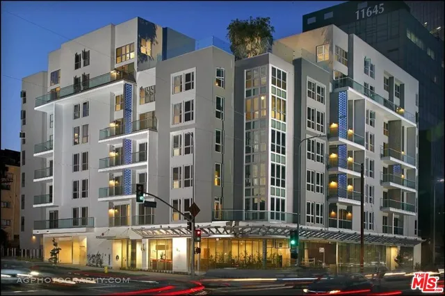 a front view of a building with street view