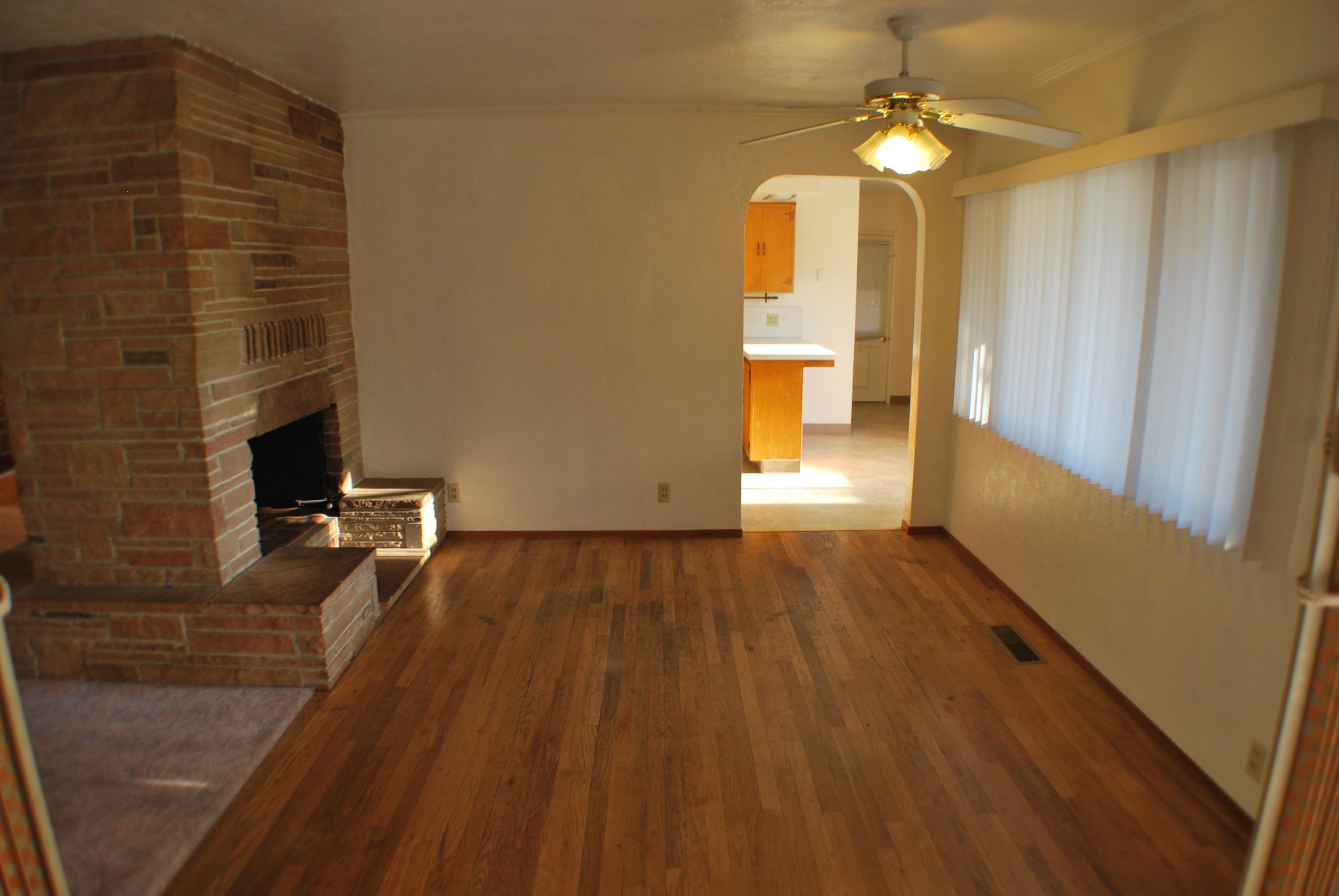 8748 Airport Road Redding, CA 96002 - Photo 2 of 10 a view of empty room with wooden floor