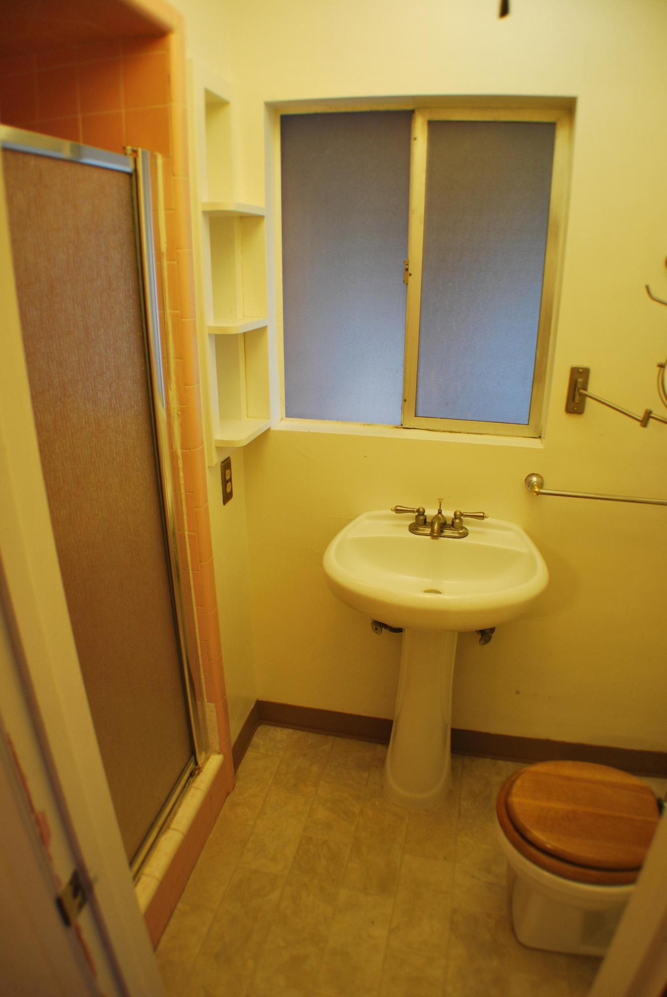 8748 Airport Road Redding, CA 96002 - Photo 6 of 10 a bathroom with a sink toilet and mirror