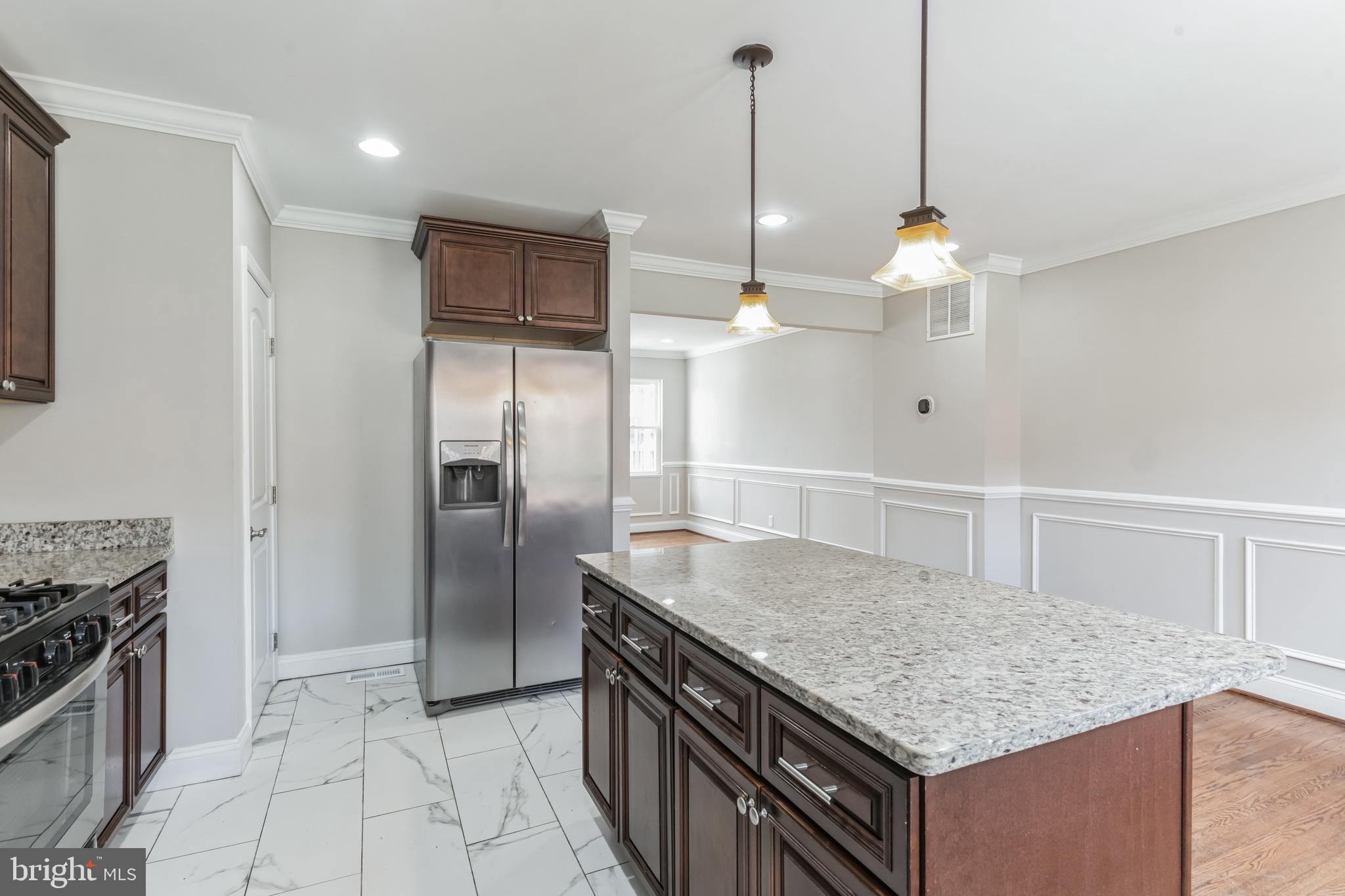 4650 Marble Hall Road Baltimore, MD 21239 - Photo 9 of 29 Large Kitchen Island for Additional Prep Space