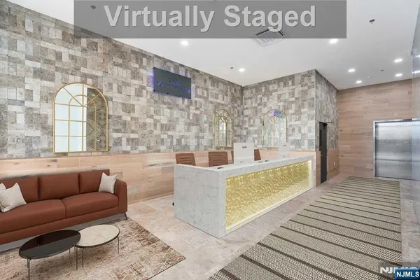 a living room with furniture and a rug