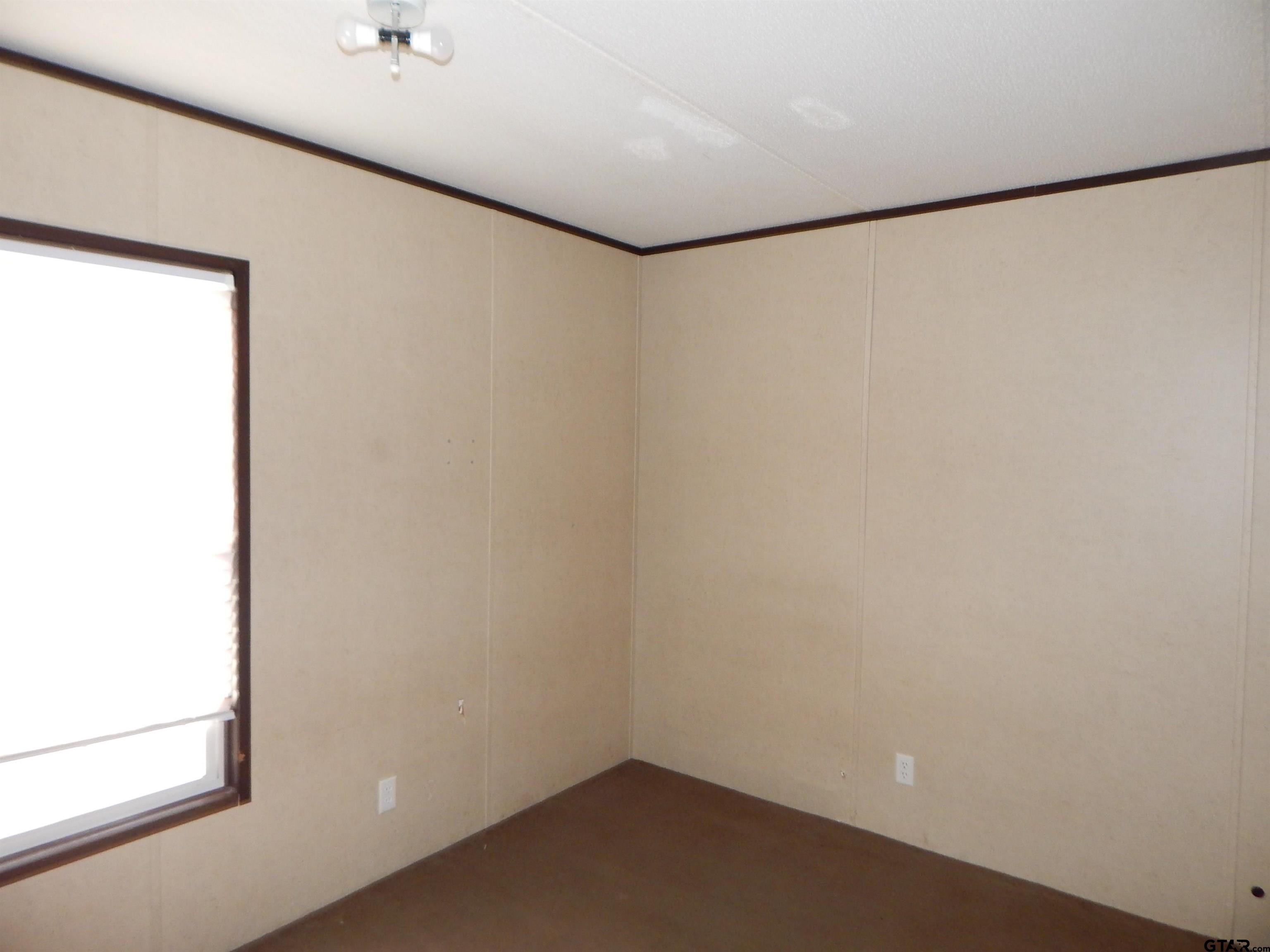 958 Boles Road Gilmer, TX 75645 - Photo 19 of 29 a small space with a window in it