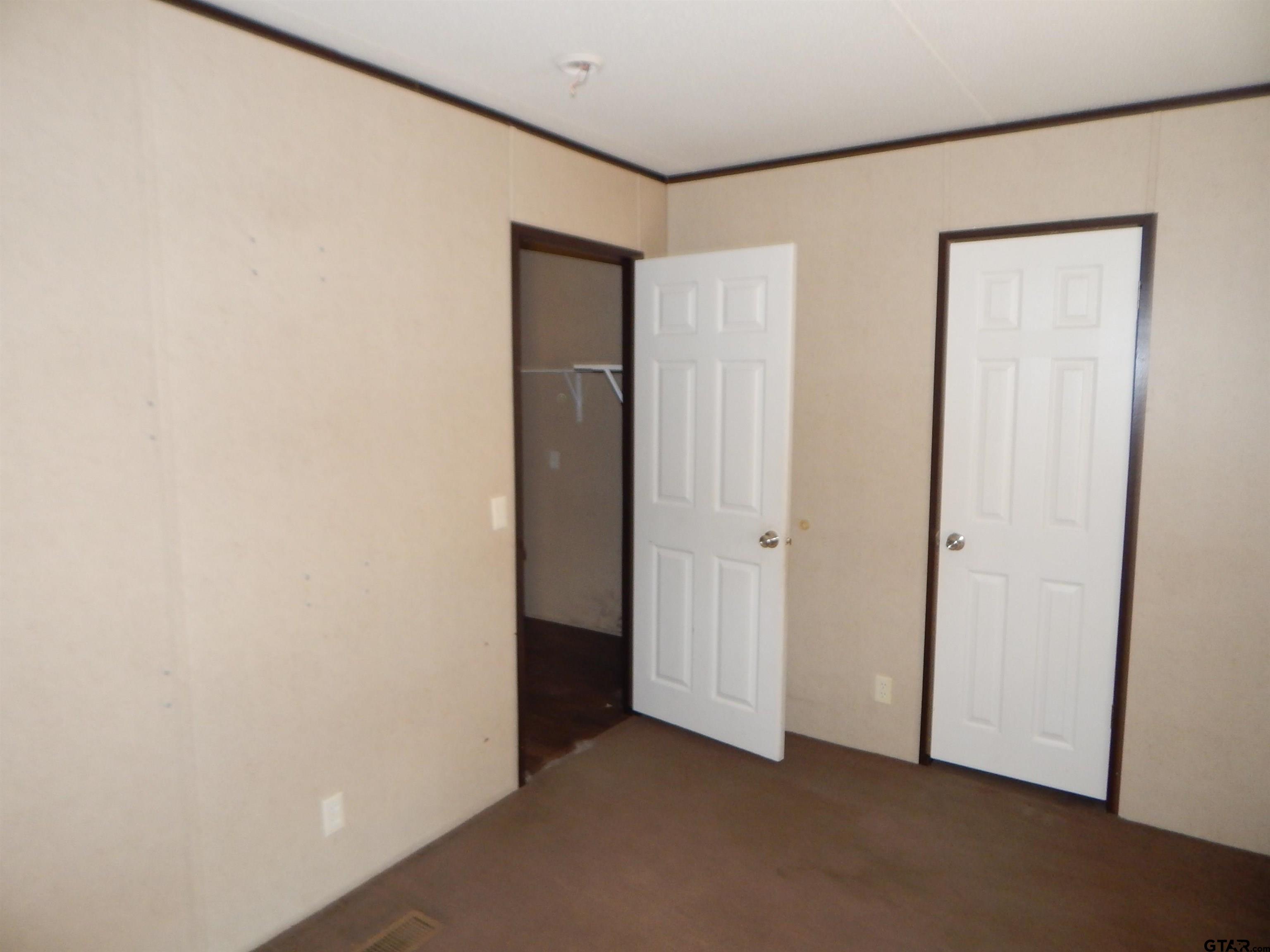 958 Boles Road Gilmer, TX 75645 - Photo 20 of 29 a view of an empty room