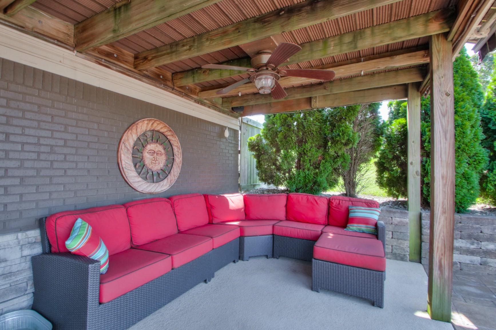 1943 Clara Mathis Road Spring Hill, TN 37174 - Photo 12 of 26 a red couch sitting in a room