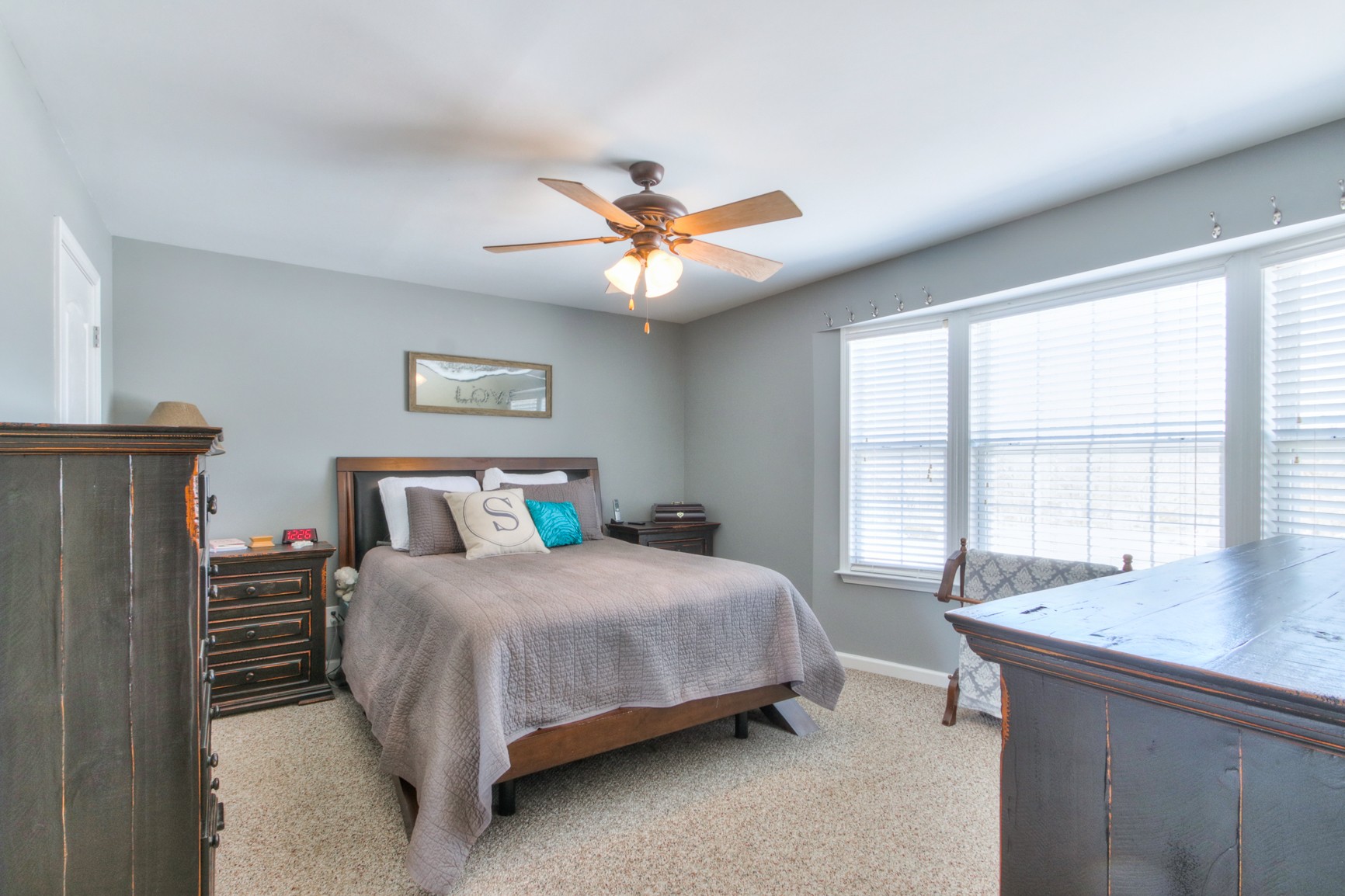 1943 Clara Mathis Road Spring Hill, TN 37174 - Photo 19 of 26 a bedroom with a bed and a large window