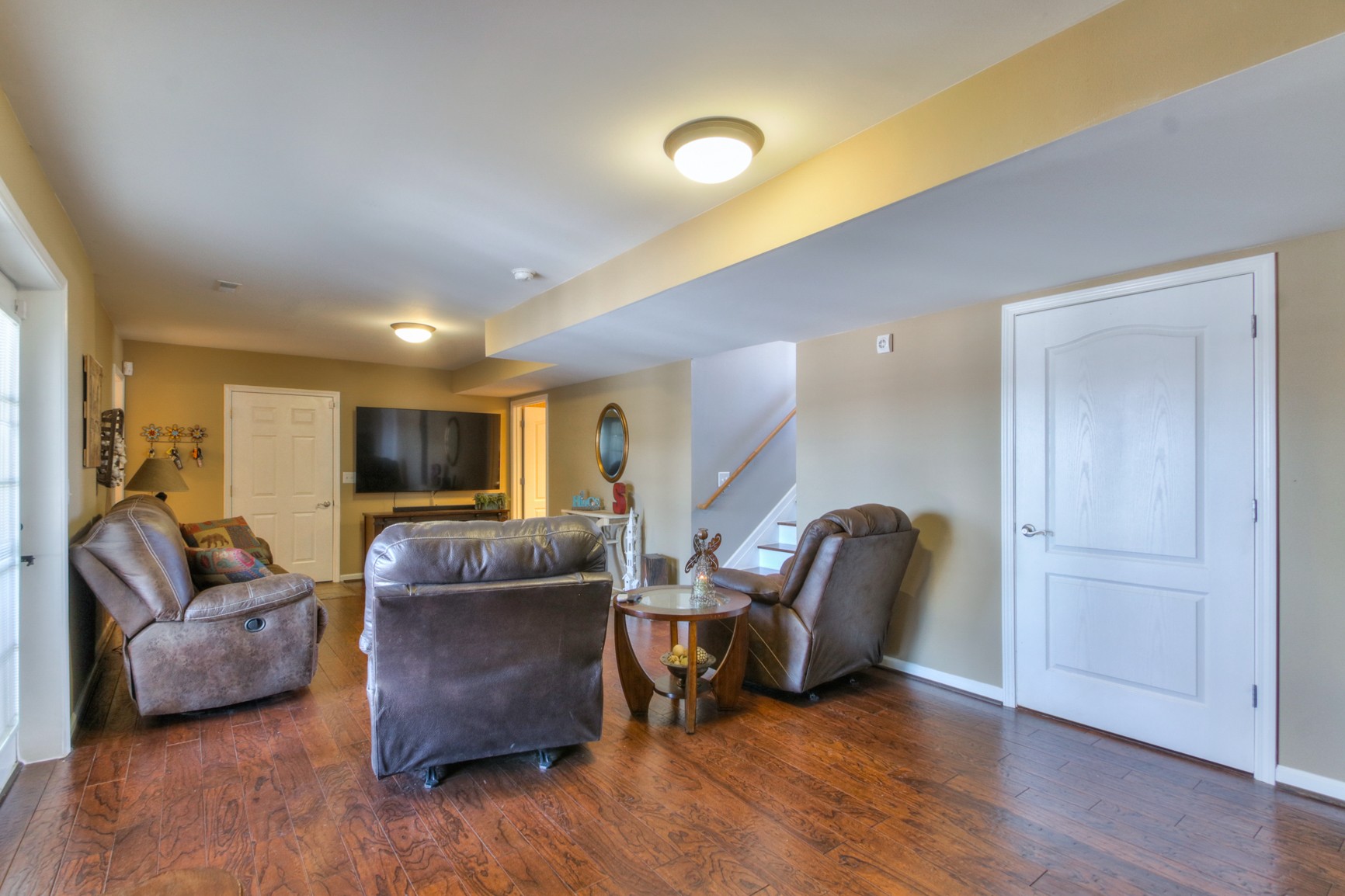 1943 Clara Mathis Road Spring Hill, TN 37174 - Photo 24 of 26 a living room with furniture and a flat screen tv