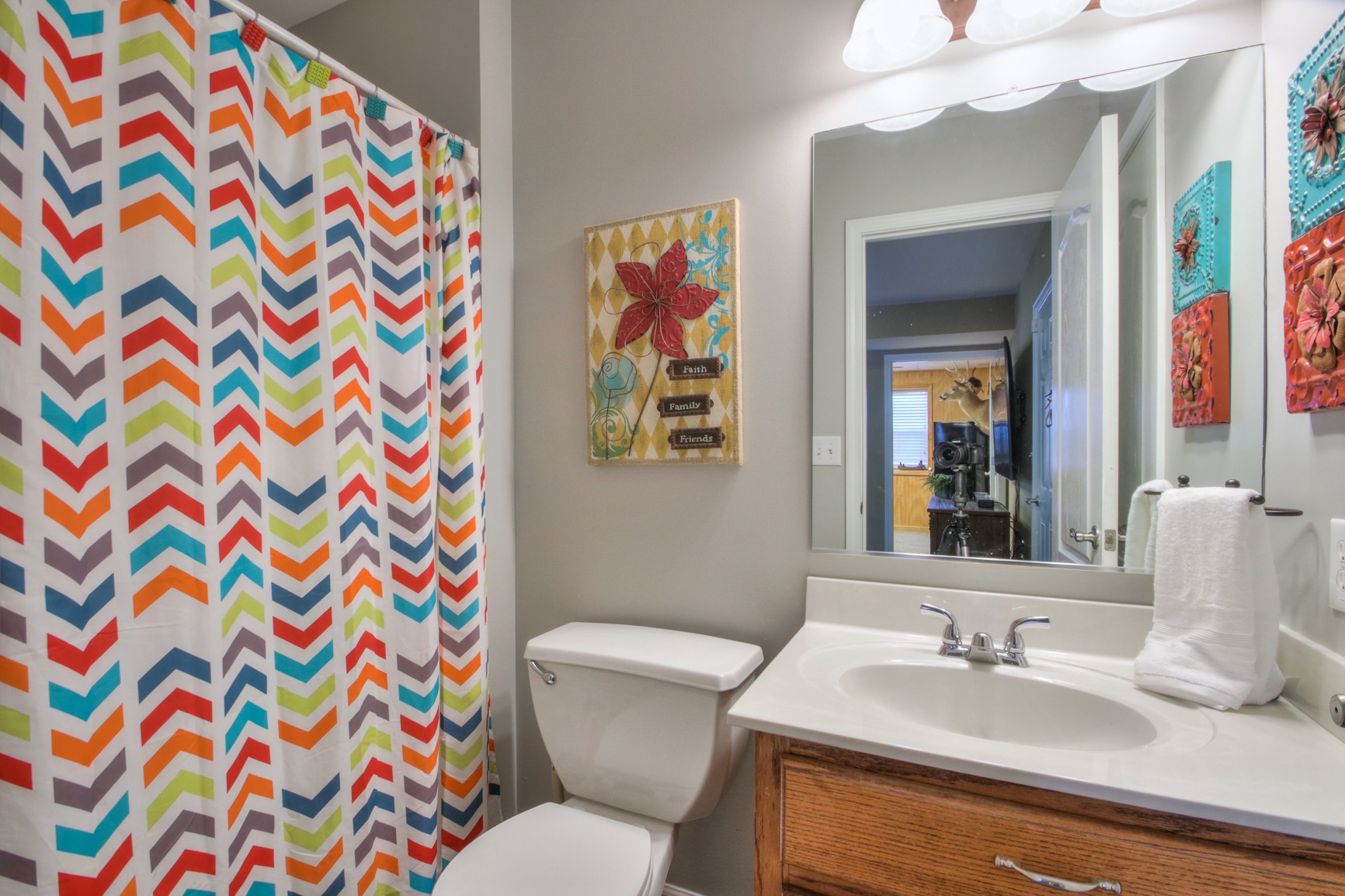 1943 Clara Mathis Road Spring Hill, TN 37174 - Photo 25 of 26 a bathroom with a sink mirror vanity and toilet