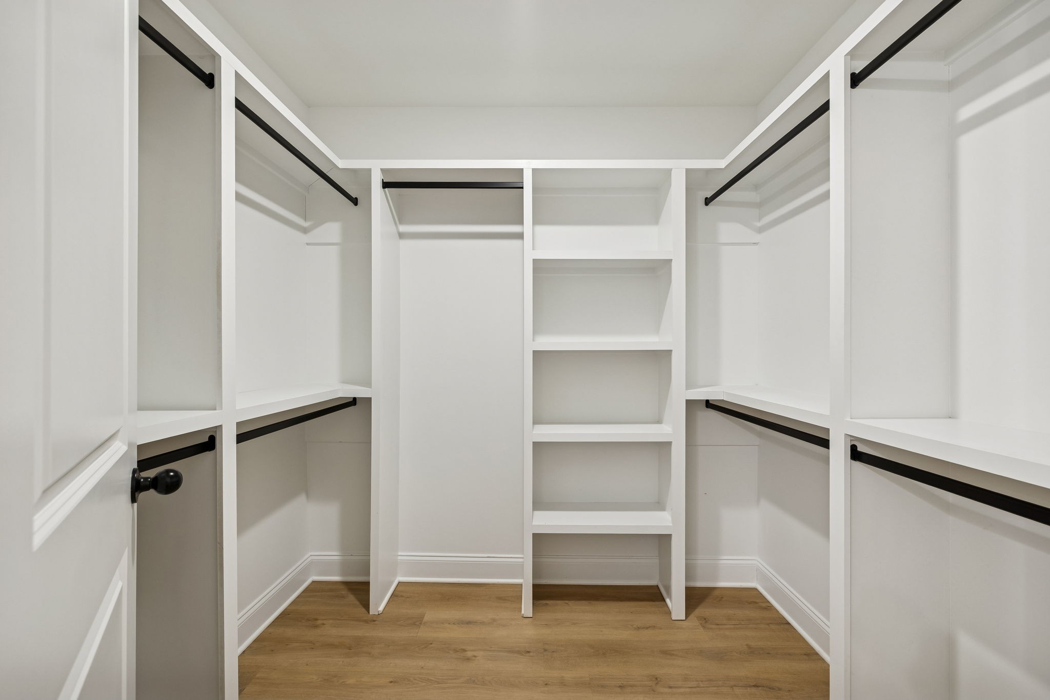 1306 Angus Way Greenbrier, TN 37073 - Photo 20 of 36 a view of walk in closet with empty racks