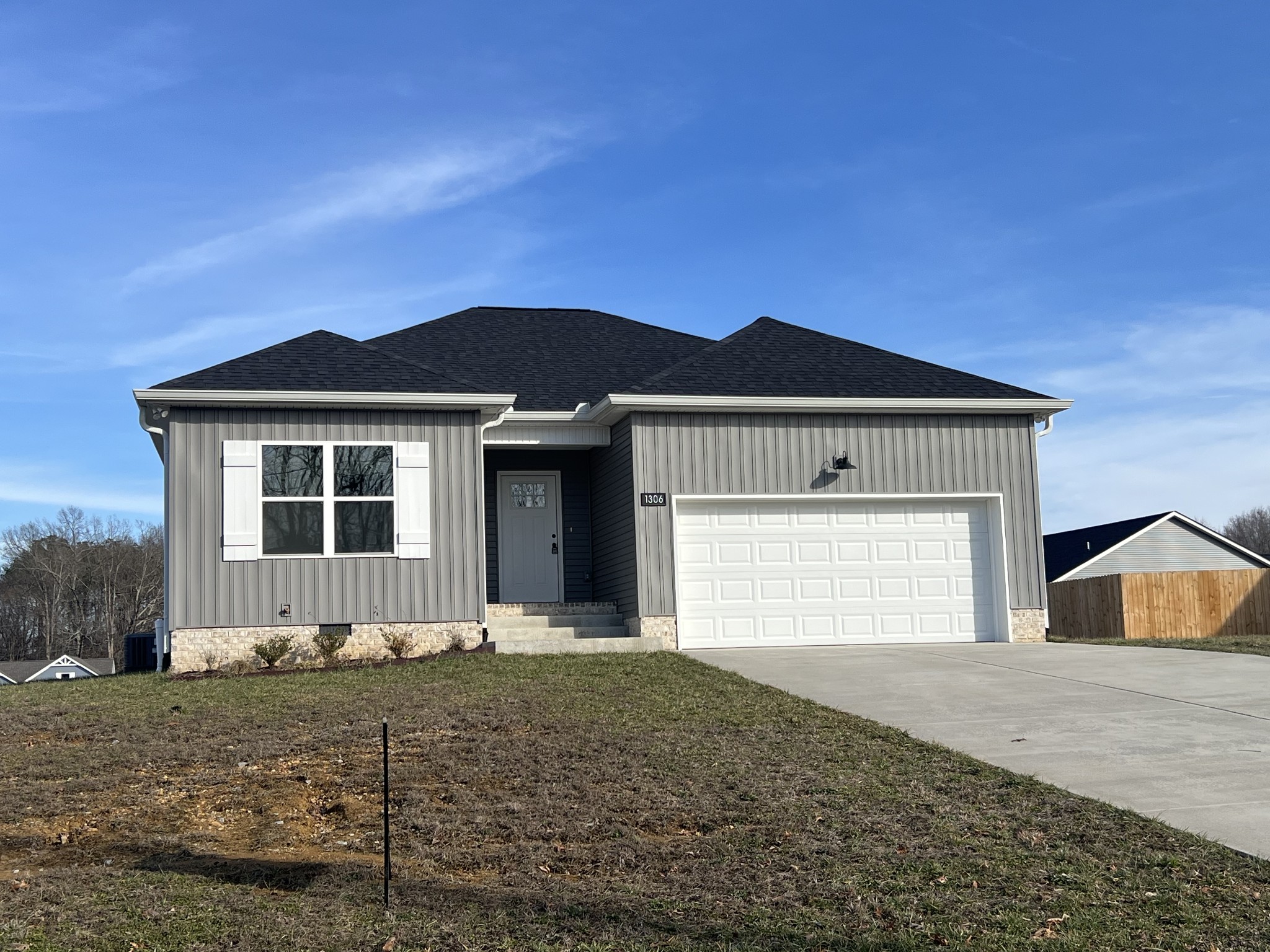 1306 Angus Way Greenbrier, TN 37073 - Photo 2 of 36 a front view of a house with a yard